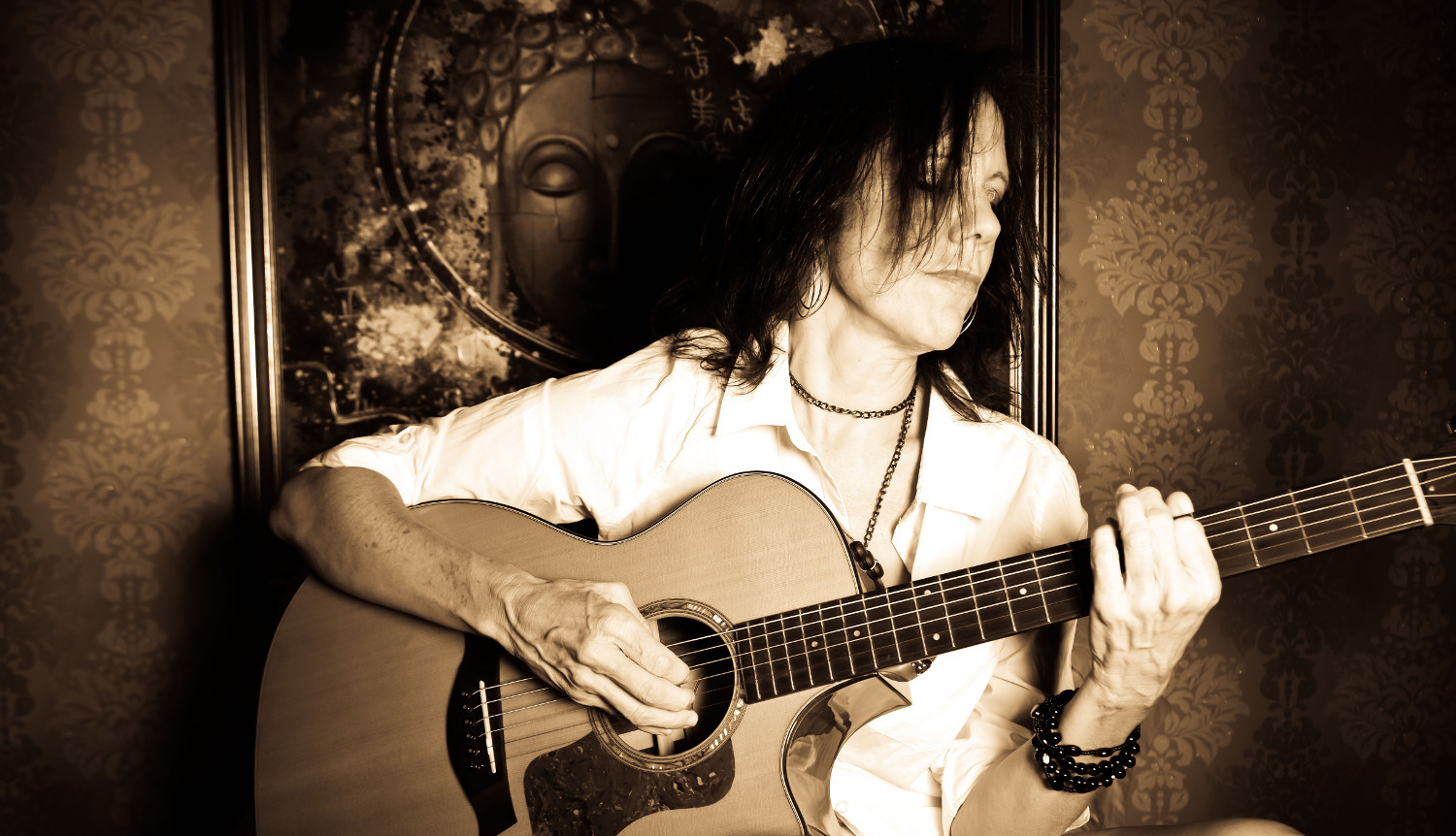 Cool black and white picture of Katrina Curtiss and her guitar